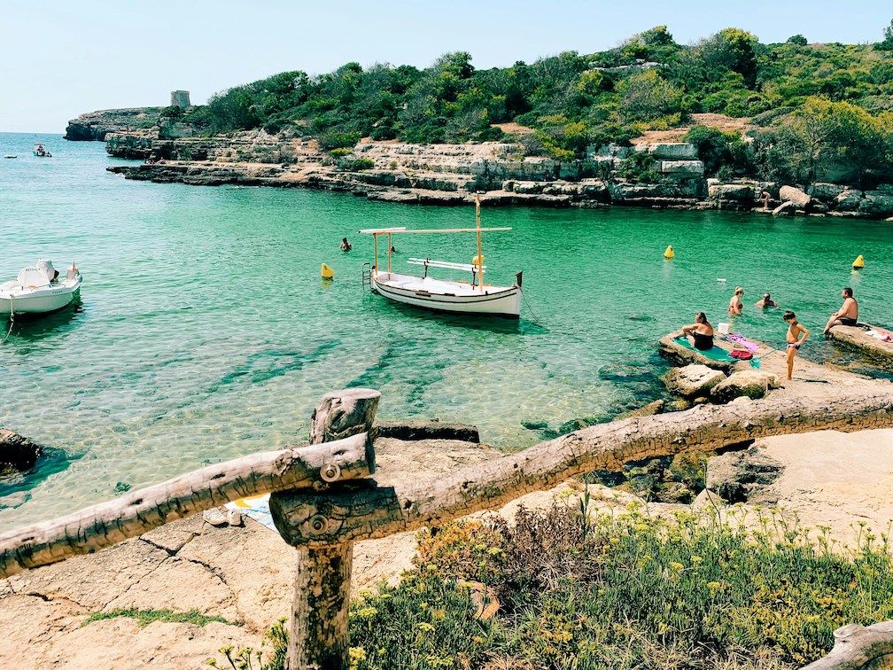Boat in cove in Menorca