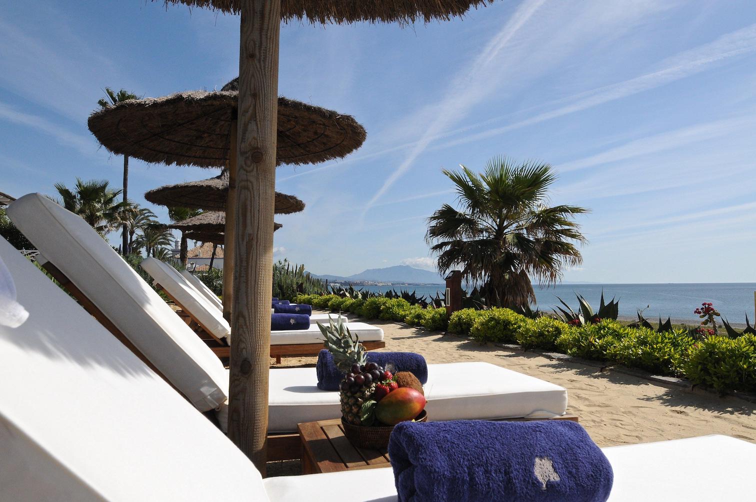 beach loungers at beach club at Finca Cortesin, one of the best hotels in Marbella